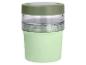 Grüner Joghurtbecher mit transparentem Oberteil