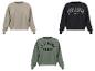 Langarm-Sweatshirts in Beige, Schwarz mit „PARIS AIMÉE“ und Grün mit „JE T'AIME PARIS“.