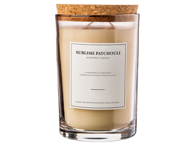 Sublime Patchouli Duftkerze im Glas mit Korkdeckel.