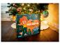 FRANZIS Adventskalender für Kinder mit Pumuckl unter dem Weihnachtsbaum.