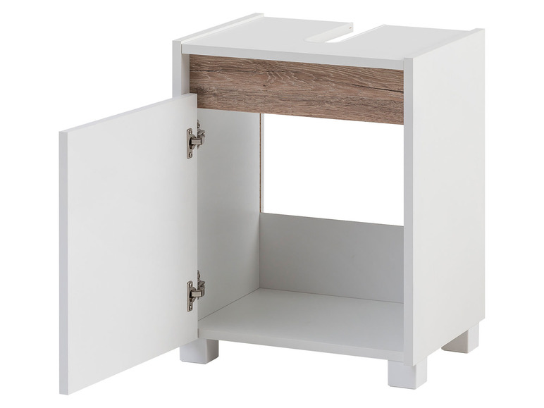 Ein weißes Badezimmermöbel mit einem offenen Fach und einer Tür.