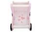 Rosa Holzpuppenwagen mit Herzen und schwarzen Rädern.