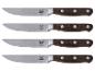 Set mit vier Sansibar Steakmessern: gewellte Klingen aus rostfreiem Stahl, dunkle Holzgriffe.