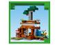 Ein LEGO Minecraft Set mit Holzstruktur, Baum und TNT.