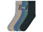 Fünf Paar Socken in verschiedenen Farben und Mustern.