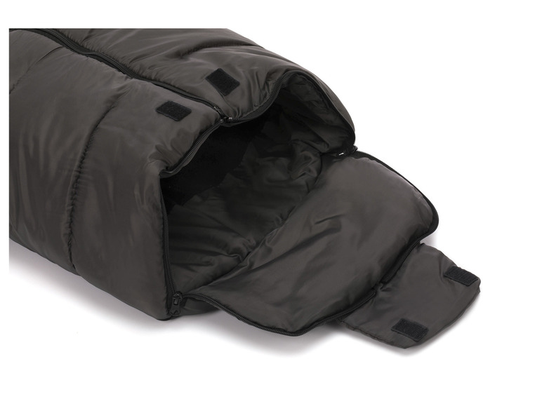 Ein offener, schwarzer Schlafsack mit Reißverschlüssen.