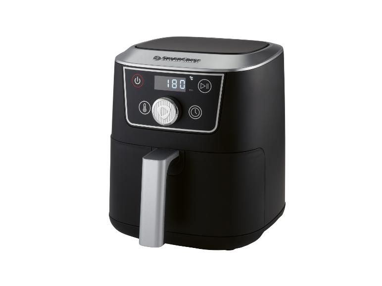 Schwarze Heißluftfritteuse mit Digitalanzeige, die 180°C und 10 Minuten anzeigt.