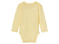 Ein gelber Babybody mit langen Ärmeln.