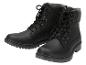 Ein Paar schwarze Schnürstiefel mit Reißverschluss auf weißem Hintergrund.