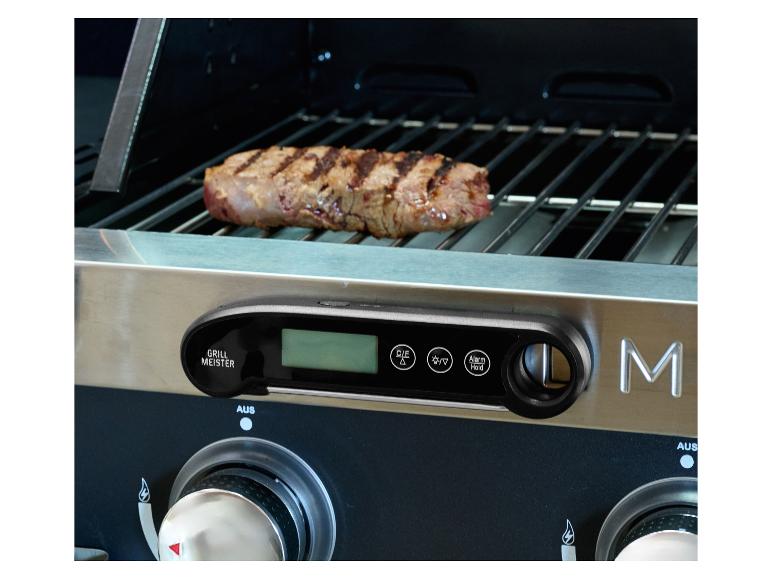 Gegrilltes Steak mit digitalem Grill Meister Thermometer auf einem Gasgrill.