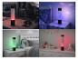 Bunte Blasenlampen in verschiedenen Räumen, darunter ein Gaming-Setup und Schlafzimmer.