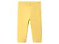 Gelbe Baumwoll-Kinderleggings auf weißem Hintergrund.