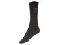 Ein Paar schwarze Hummel Socken mit Chevron-Logo.