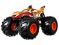 Ein orangefarbener und schwarzer Hot Wheels Monster Truck mit großen Reifen.