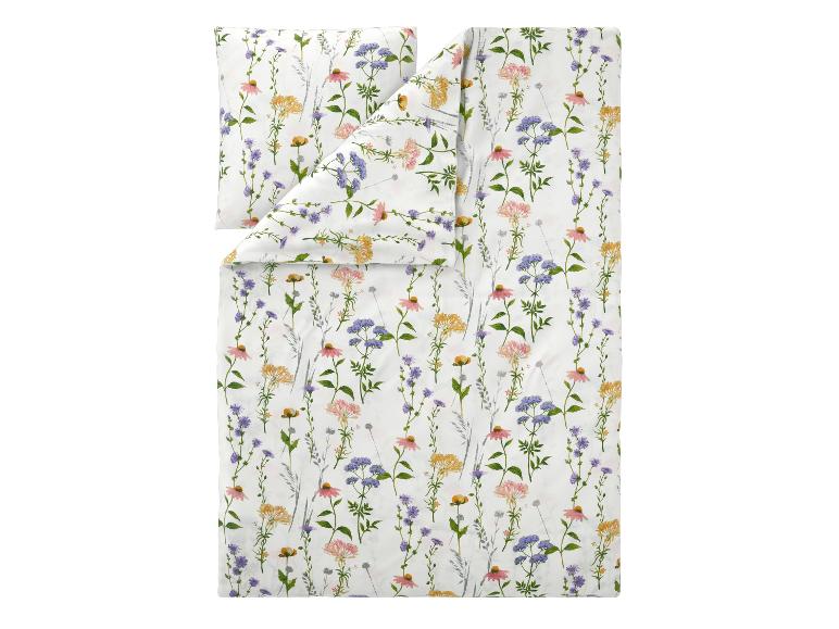 Bettwäsche-Set mit farbenfrohem Wildblumenmuster auf weißem Hintergrund.