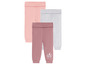 Drei Paar Leggings für Babys in Rosa, Grau und Dunkelrosa.
