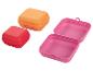 Lunchboxen in Orange, Rosa und Rot; ideal für Sandwiches.