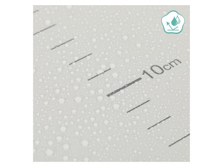 Wasserdichte FILLIKID Soft Care EVA Wickelauflage mit Wassertropfen und 10cm Messung.