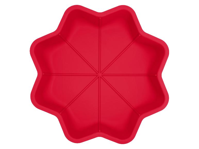 Rote Silikonform in Form einer siebenzackigen Blume