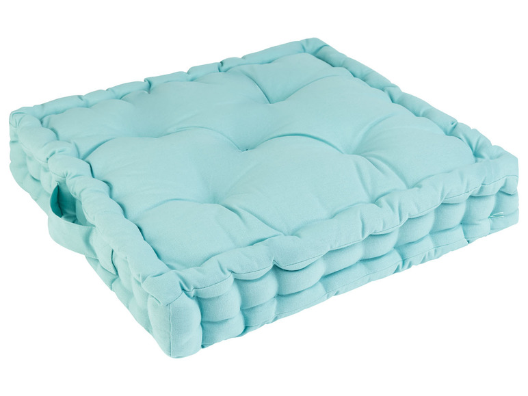 Ein hellblaues Sitzkissen mit Griff.