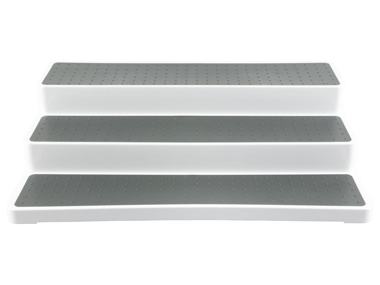 Dreiteiliges Regal mit grauer Oberfläche.