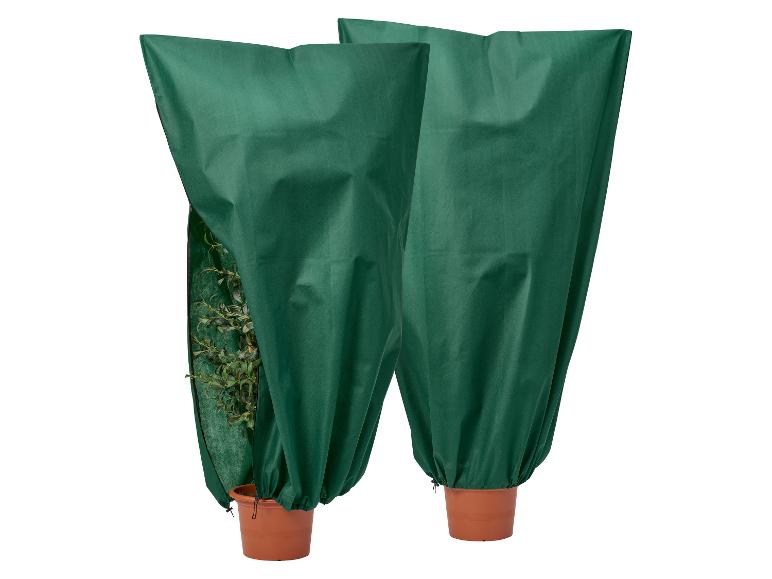 Zwei grüne Pflanzenabdeckungen, eine offen, die eine Topfpflanze zeigt.