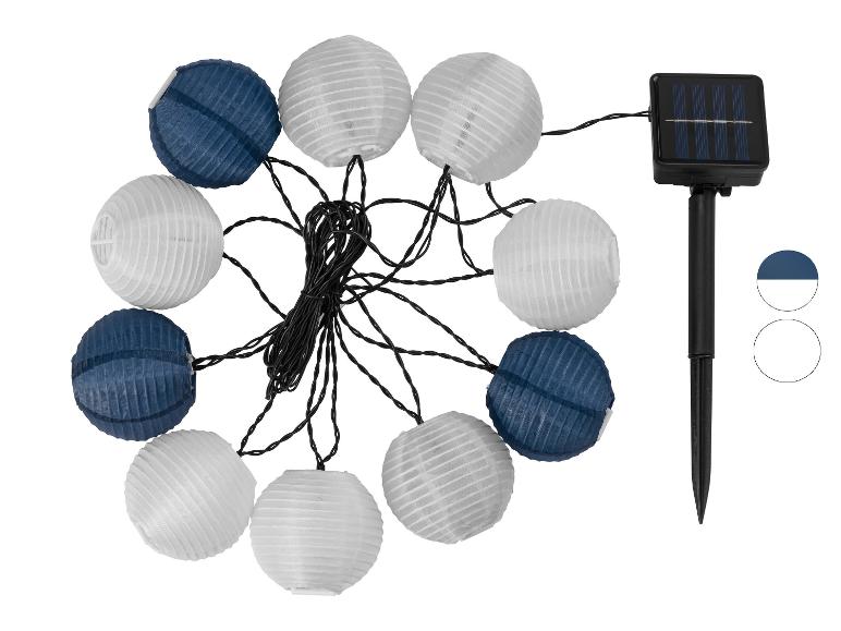 Solar-Lichterkette mit blauen und weißen Lampions.