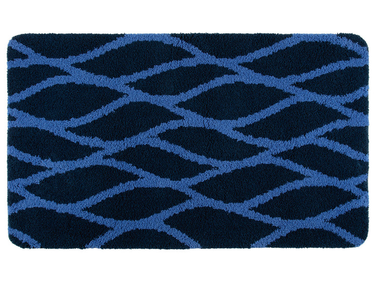 Blaue und dunkelblaue Badematte mit Wellenmuster.