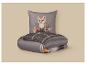 Flauschiges Kissen mit Fuchsmotiv und karierte Bettdecke mit Fuchs.