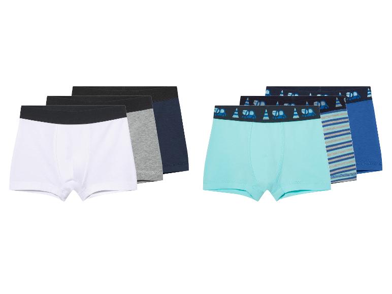  Jungen-Boxershorts: Weiß, Grau, Dunkelblau und türkis mit Fahrzeugmotiv.