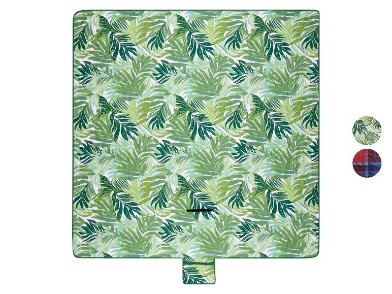 Picknickdecke mit grünem Palmenblattmuster und einer kleinen Probe eines roten Karomusters.