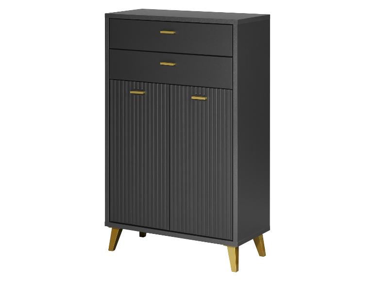 Ein dunkelgrauer Schrank mit goldenen Griffen und Beinen.