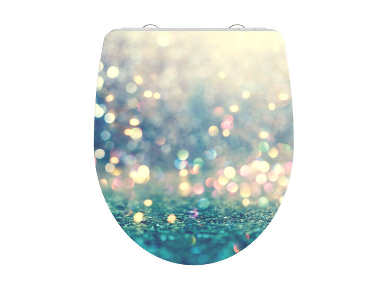 Ein Toilettensitz mit einem glitzernden Design.