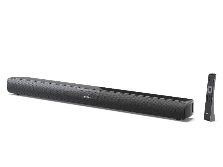 Schwarze Soundbar mit Fernbedienung auf weißem Hintergrund.
