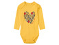 Gelber Babybody mit Herz-Print im maritimen Stil.