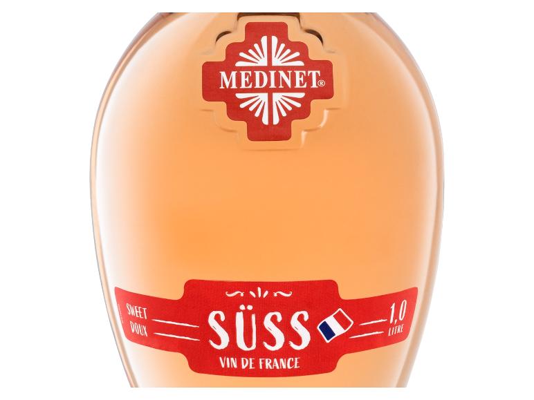 Eine Flasche Medinet Roséwein, süß, 1,0 Liter, mit rotem Etikett.