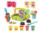 Play-Doh Garten-Set mit Korb, Töpfen, Werkzeugen und fünf Dosen Knetmasse.