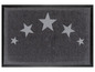 Eine graue Fußmatte mit Sternenmuster.