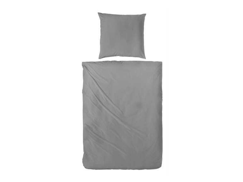 Ein grauer Bettbezug mit passendem Kissenbezug.