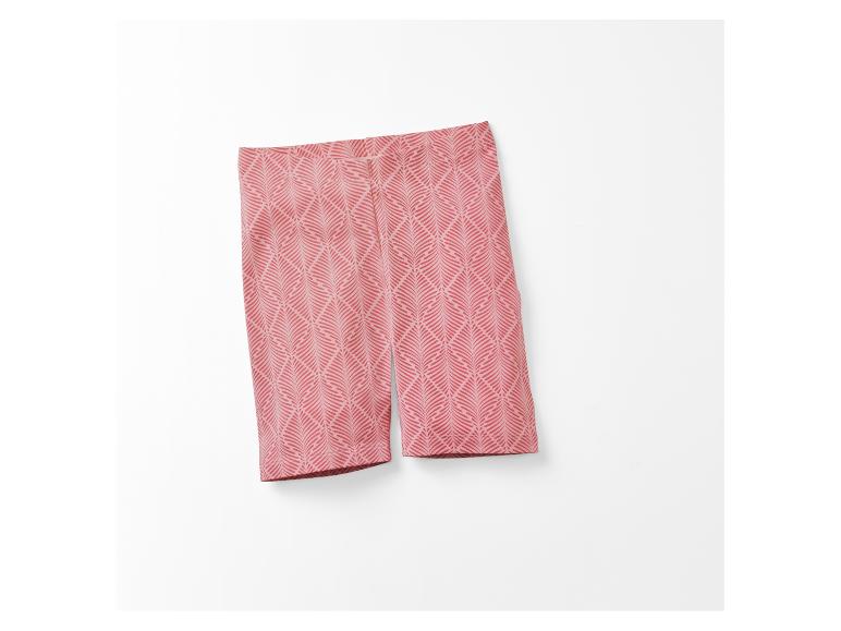 Rosa Radlerhose mit Blattmuster.
