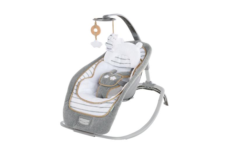 Grau-weiße Babywippe mit Spielzeug und Sicherheitsgurten.