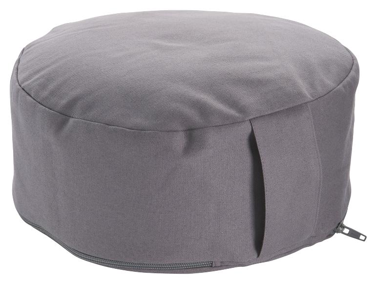 Ein graues Meditationskissen mit Reißverschluss.