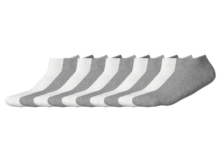 Eine Packung mit acht Paar weißen und grauen Kurzsocken.