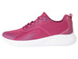 Ein rosafarbener Sneaker mit weißer Sohle.