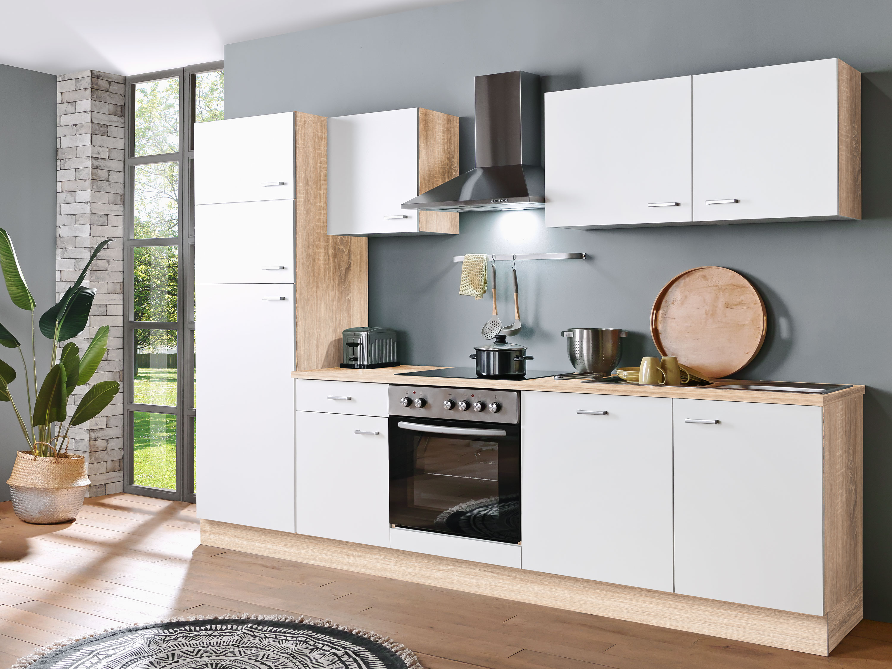 Menke Küchenblock Classic 1 (mit Geschirrspüler, 280 cm, Weiß, frei Verwendungsstelle)““ | Einbauherd-Set, Dunstabzugshaube, optional mit Geschirrspüler Türen: 9 Türen Schublade: 1 270 cm, ohne Geschirrspüler Einbau-Kühlgefrierkombination Gk225.4A+Ebn Technische Daten: Geräteart: Einbau-Kühlgefrierkombination Kategorie des Haushaltskühlgerätemodells: 7 – Kühl-Gefriergerät Klimaklasse: ST (Umgebungstemperatur 16-38 °C) Energieeffizienzklasse A (höchste Effizienz) bis G (geringste Effizienz) nach neuer EU Norm: F Jährlicher Energieverbrauch: 219 kWh/Jahr Nutzinhalt Gesamt: 205 Liter Nutzinhalt Kühlen: 169 Liter Nutzinhalt Gefrieren: 36 Liter Sterne Kennzeichnung: 4 Sterne Gefriervermögen in 24 Stunden: 2,00 Kg Max. Lagerzeit bei Störungen: 18,00 Stunden Geräuschemission: 39 dB(A) re 1 pW Luftschallemissionsklasse: C Kühlmittel: R600a Kühlmittelmenge: 49 Gramm Angabe zum Gerät: Einbau Ausstattung: Regelbares Thermostat: ja Kompressor: 1 Wechselbarer Türanschlag: ja Schleppscharniere: ja Abtauverfahren Kühlen: automatisch Abtauverfahren Gefrieren: manuell Beleuchtung im Kühlraum: LED Glasablagen Kühlraum: 3 Gemüseschublade mit bruchsicherer Glasabdeckung: 1 Türablagen: 4 Eierablagen: 2 Ablage im Gefrierteil: 1 Drahtablage Einbauherd-Set Bic3-I GK Ix-2 Technische Daten: Geräteart: Einbauherdset Bedienpanel: Edelstahlblende Energieeffizienzklasse A+++ (höchste Effizienz) bis D (geringste Effizienz): A Energieeffizienzindex: 94,9 Energieverbrauch (konventionell): 0,76 kW/h Anzahl Wärmequellen pro Garraum: 1 (Elektro) Nutzbares Volumen des Garraums: 59 Liter Größe des Gerätes mittel: 35 l Restwärmeanzeige: ja Funktionen Backofen: Oberhitze, Unterhitze, Ober- und Unterhitze Geräuschemission: Material Kochfeld: Glaskeramik Anzahl Kochfelder: 4 Durchmesser Kochfeld vorne links: 18,00 cm Durchmesser Kochfeld hinten links: 14,00 cm Durchmesser Kochfeld hinten rechts: 18,00 cm Durchmesser Kochfeld vorne rechts: 14,00 cm Leistung Kochfeld vorne links und hinten rechts: 1800 Watt Leistung Kochfeld orne rechts und hinten links: 1200 Watt Maximale Leistung: 8350 Watt Spannung: 220-240 Volt Frequenz: 50 Hz Ausstattung: Backofentür: schwarzes Glas Backofentür Glasschichten: 2 Vollglasinnentüre: ja Gehäusekühlung: ja Griff und Knöpfe: Aluminium Dunstabzugshaube 6091H Technische Daten: Geräteart: Dunstabzugshaube Material: Edelstahl Einbaubreite: 60 cm Wandmontage: ja Drucktasten: 5 Stück Umluftbetrieb: ja Abluftbetrieb: ja Jährlicher Energieverbrauch (AEChood): 27,70 kWh/Jahr Energieeffizienzklasse A+++ (höchste Effizienz) bis D (geringste Effizienz): B Fluiddynamische Effizienz (FDEhood): 13,60 Fluiddynamische Effizienzklasse: D Beleuchtungseffizienz (LEhood): 34,50 lux/Watt Beleuchtungseffizienzklasse: A Fettabscheidegrad: 70,80 Klasse für den Fettabscheidegrad: D Luftstrom bei minimaler Geschwindigkeit: 222 m³/h Luftstrom bei maximaler Geschwindigkeit: 348 m³/h A-bewertete Luftschallemission bei minimaler Geschwindigkeit: 57 dB/A A-bewertete Luftschallemission bei maximaler Geschwindigkeit: 64 dB/A Leistungsaufnahme im Aus-Zustand (Po): 0,00 Watt Leistungsaufnahme im Bereitschaftszustand (Ps): 0,00 Watt Leistungsaufnahme des Lichtsystems (Wl): 2,00 Watt Anschlusswert: 67,00 Watt Beleuchtungssystem: LED Leistungsaufnahme je Beleuchtungseinheit: 1 x 2,00 Watt Spannung: 220-240 Volt Frequenz: 50 Hz Ausstattung: Fettfilter Menge: 2 x Mf01 Fettfilter Material: Aluminium Fettfilter spülmaschinenfest: ja Teleskopkamin ausziehbar: von bis 40,00-78,00 cm Gesamthöhe durch Teleskopkamin: 96,00 cm Benötigte Menge Kohlefilter mit Modelbezeichnung: 2 x Cf130 Mitgeliefertes Zubehör: Rückschlagklappe