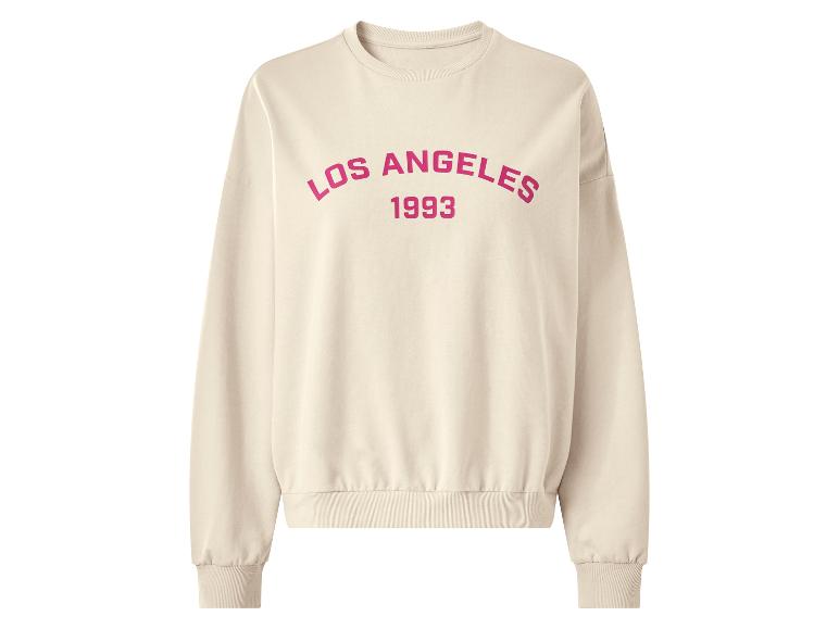 Beiges Sweatshirt mit rosa Schriftzug „LOS ANGELES 1993“.