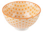 Eine orangefarbene Schüssel mit einem geometrischen Muster.