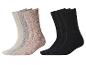 Sechs Paar gerippte Socken, drei in neutralen Tönen und drei in Schwarz