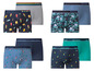 Ein Set Happy Shorts mit verschiedenen Mustern, darunter Eis am Stiel, Blumen und Ananas.