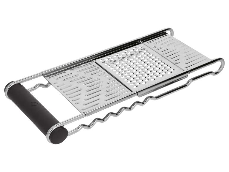 Küchenreibe aus Metall mit schwarzem Griff, mit drei verschiedenen Reibeflächen.